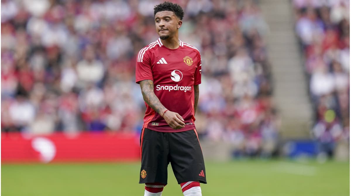 Player wearing Manchester United kit on the pitch