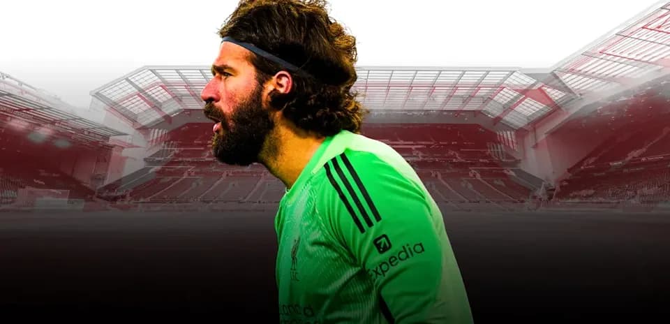 Goalkeeper Alisson Becker in Liverpool kit profile view