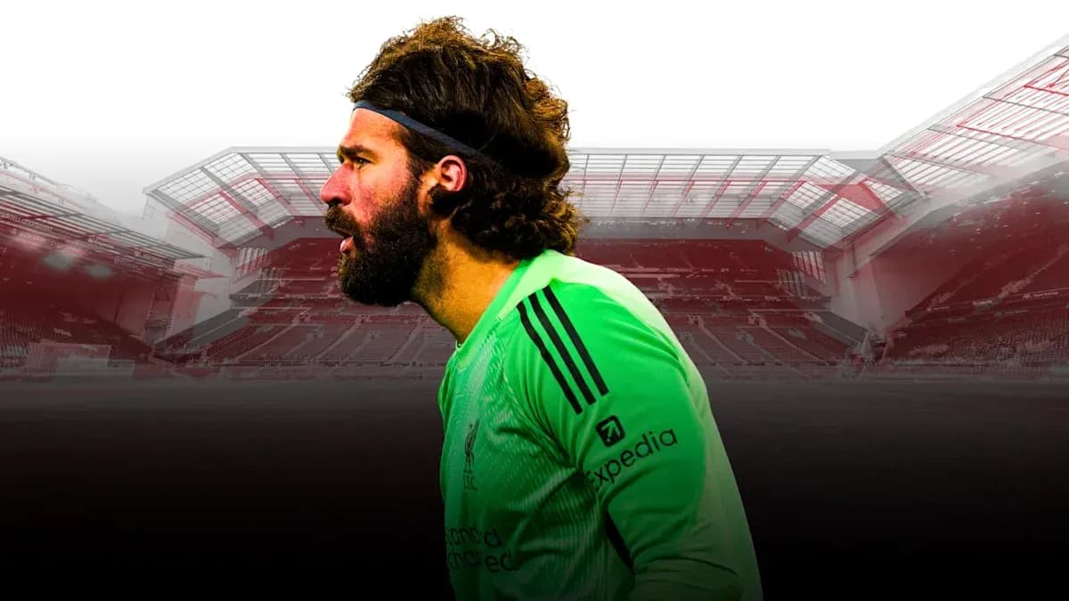 Goalkeeper Alisson Becker in Liverpool kit profile view