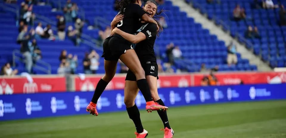 Players celebrating during NJ/NY Gotham FC match