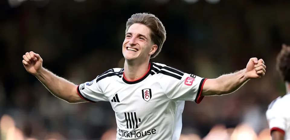 Fulham player celebrating after scoring a goal