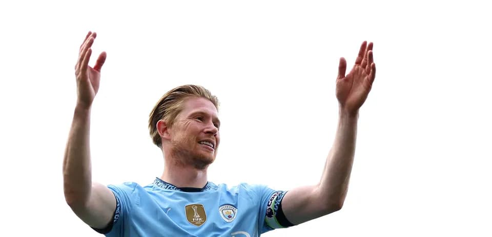 Player celebrating with raised arms in jersey