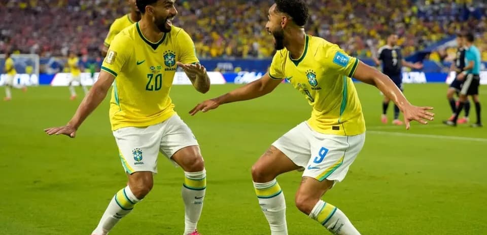 Brazilian players celebrating a goal on the field