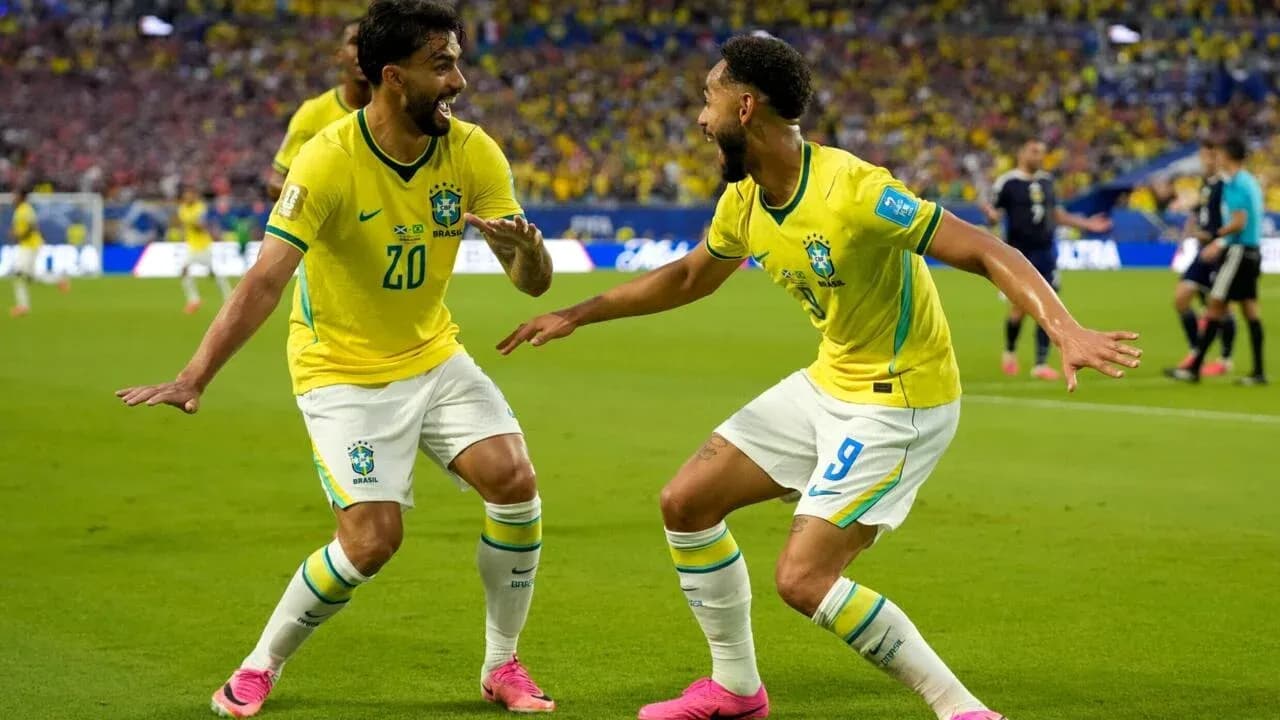 Brazilian players celebrating a goal on the field