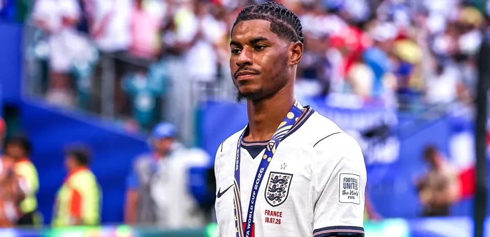 Player in England jersey walking after match