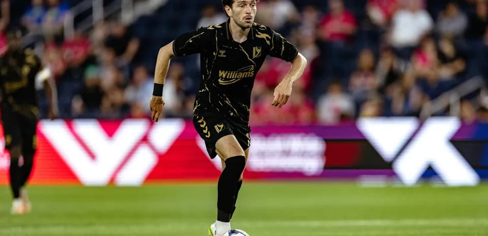 Player dribbling the ball during USL match