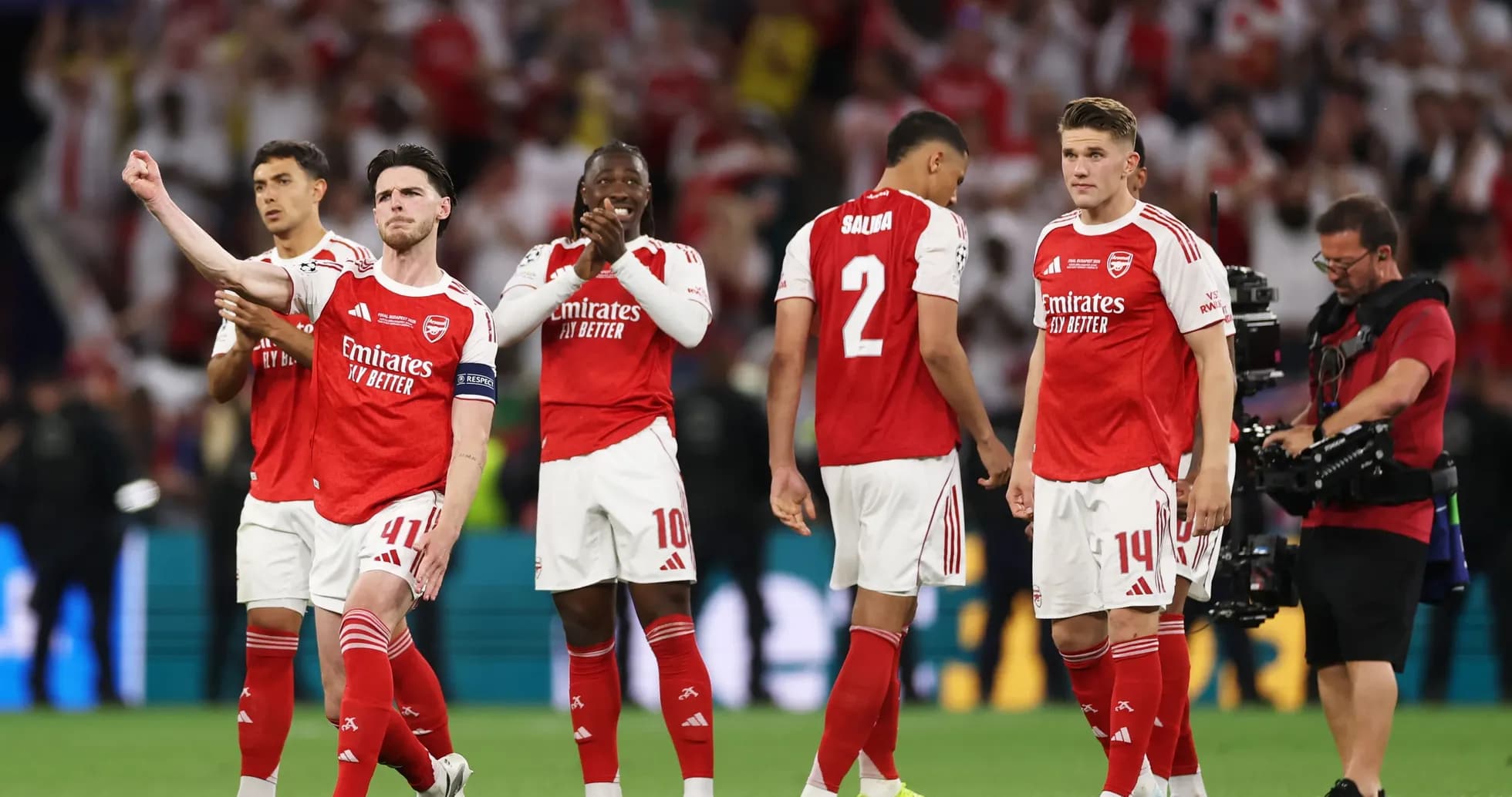 Arsenal players celebrating after match victory
