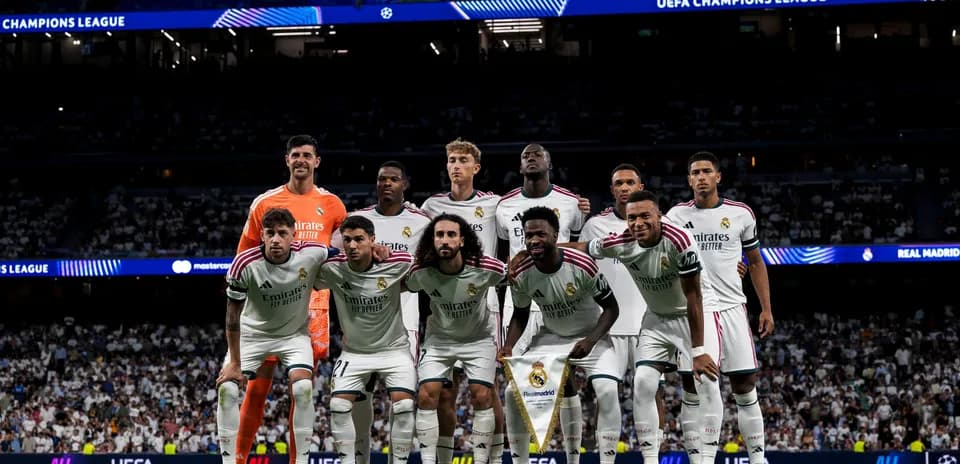 Real Madrid team posing before Champions League match