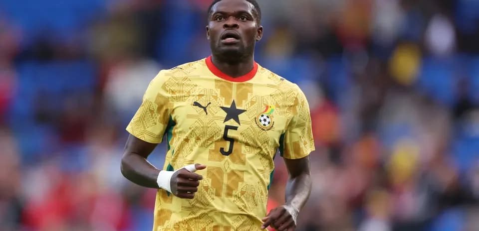 Player in Ghana national team jersey on field