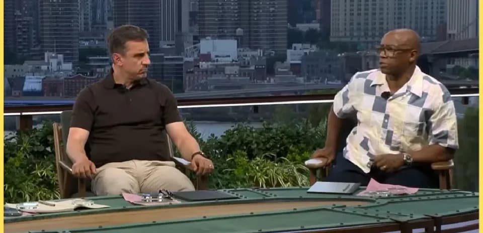 Two analysts discussing sports on a studio set