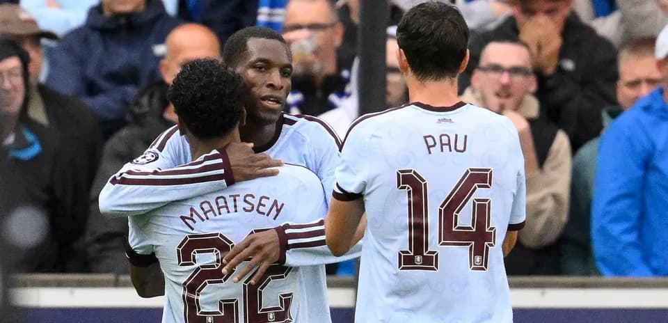 Players celebrating a goal during the match