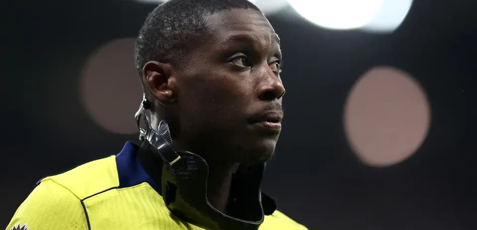 Player wearing a neck brace on the field