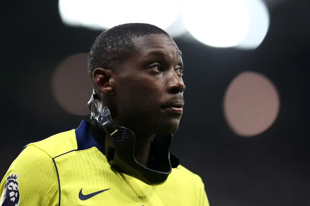 Player wearing a neck brace on the field