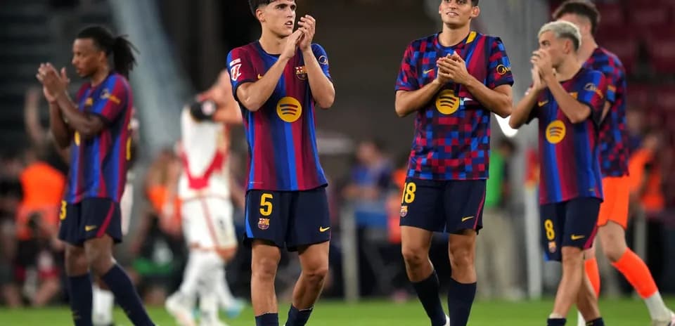 Barcelona players applauding after the match