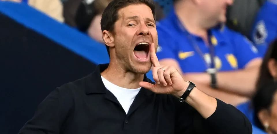 Coach shouting instructions from the sidelines during match