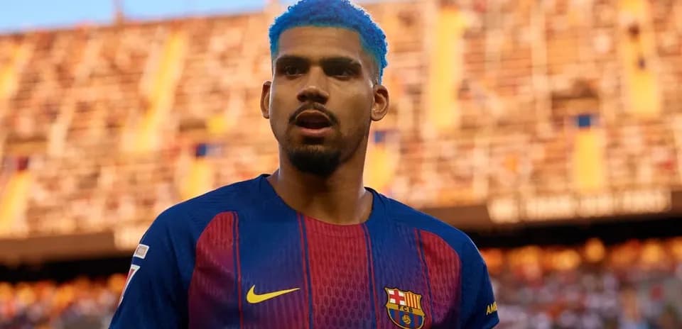 Player in Barcelona jersey at stadium