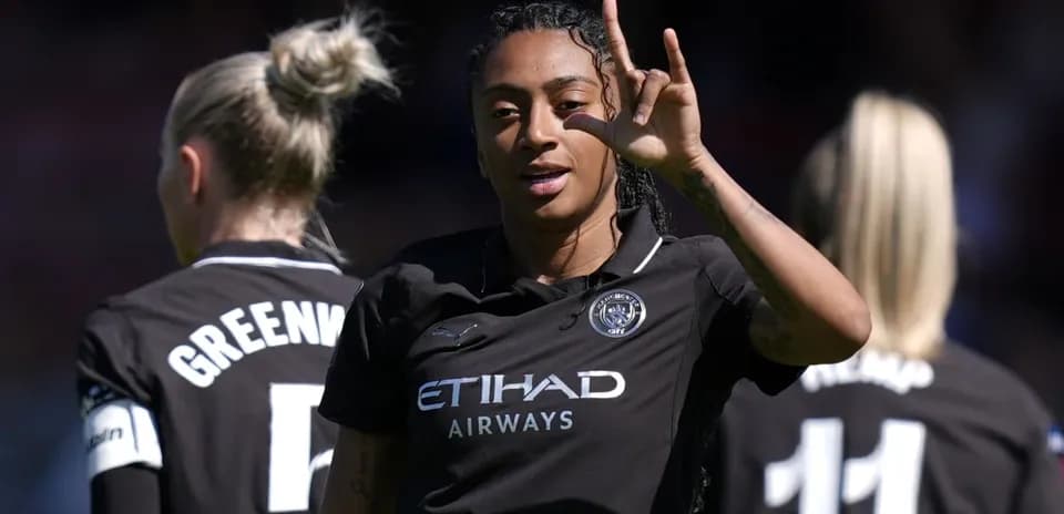 Player gesturing during match with teammates in background