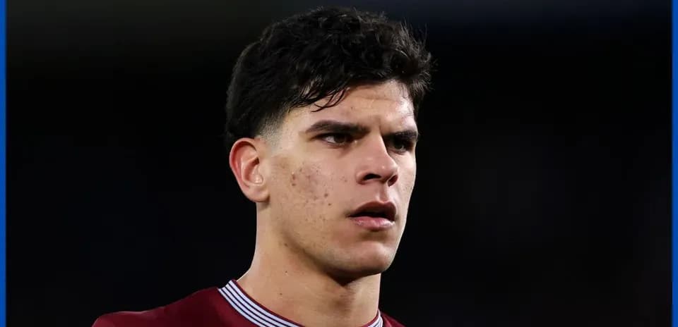 Player in maroon jersey during match close-up