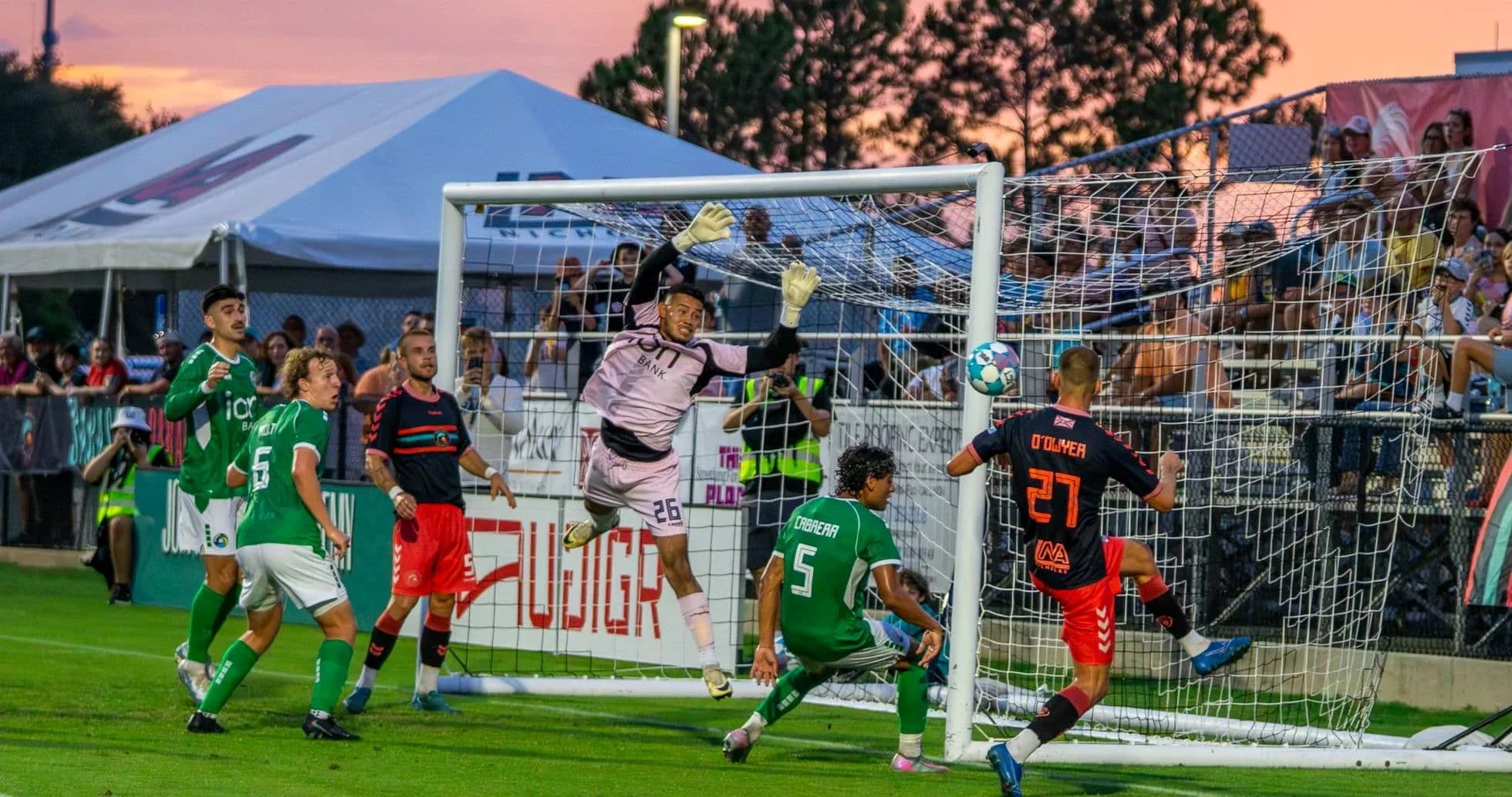 Goalkeeper making a save during USL match