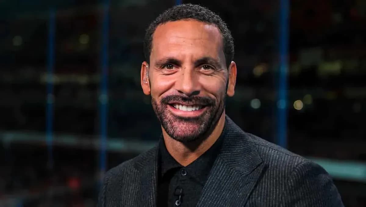 Sports analyst smiling during broadcast segment Sports analyst smiling during broadcast segment