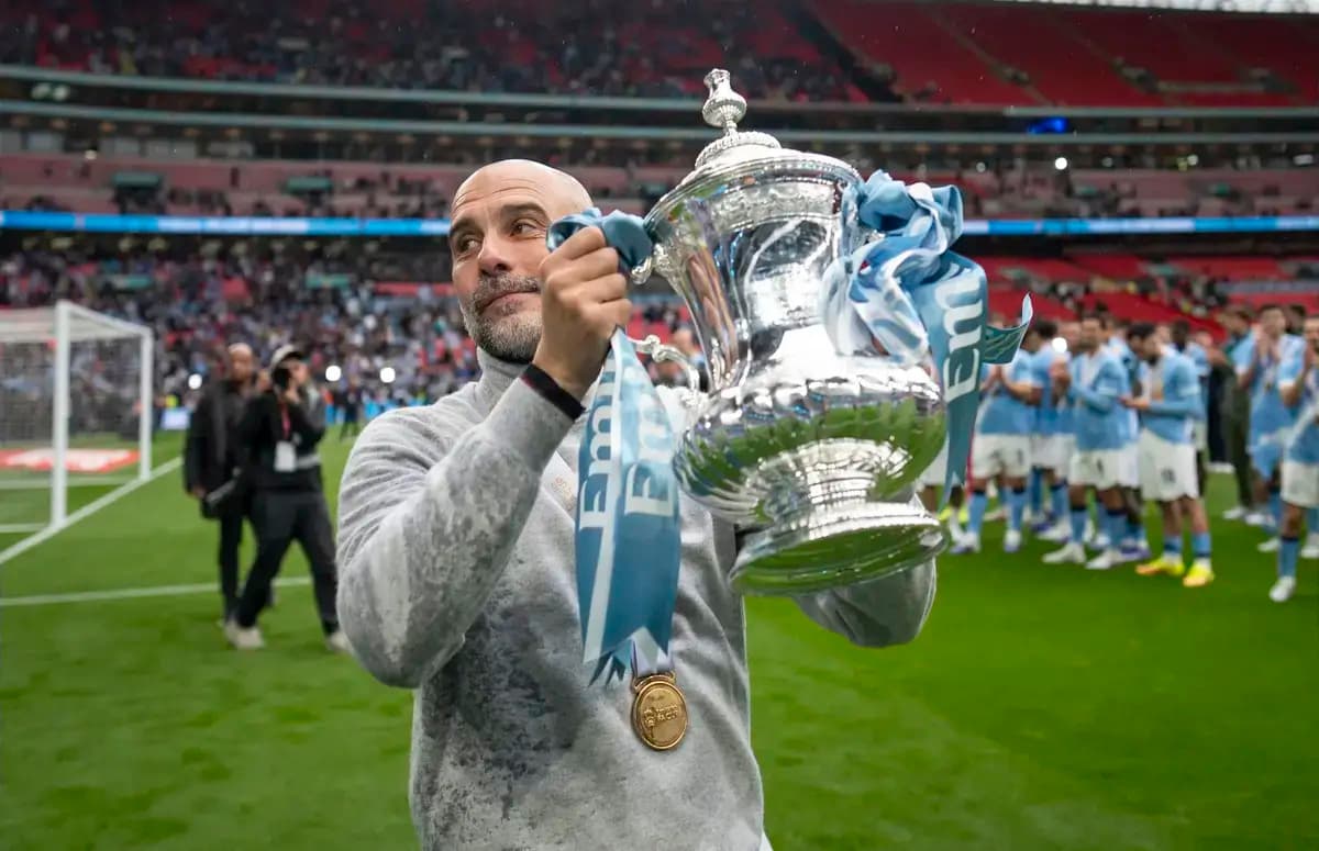 Coach holding trophy after winning the match