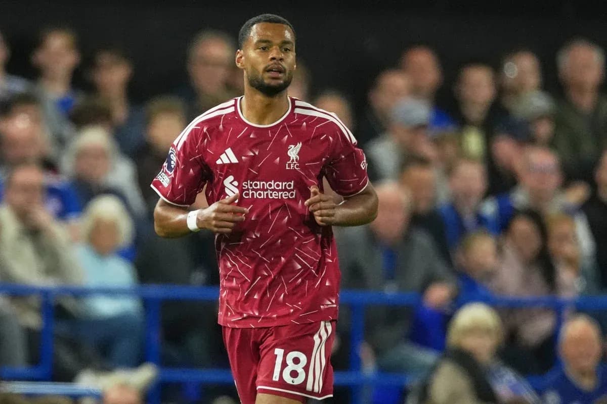 Liverpool player running on the pitch during match