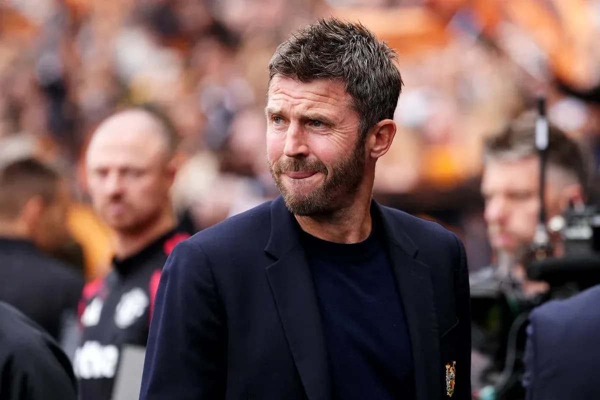 Manager walking on the pitch before the match