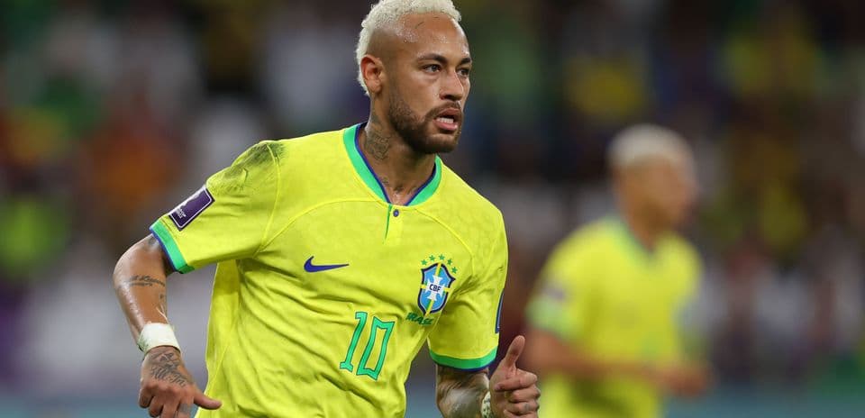 Neymar celebrating a goal in Brazil's yellow kit