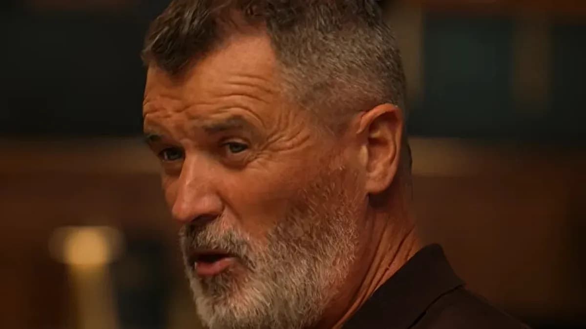 Man with a beard speaking in a casual setting