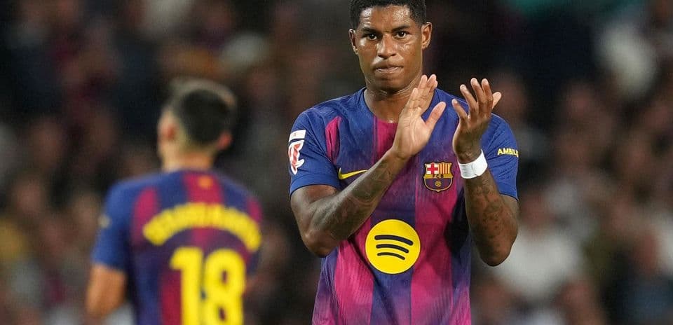 Barcelona player applauding during match at stadium