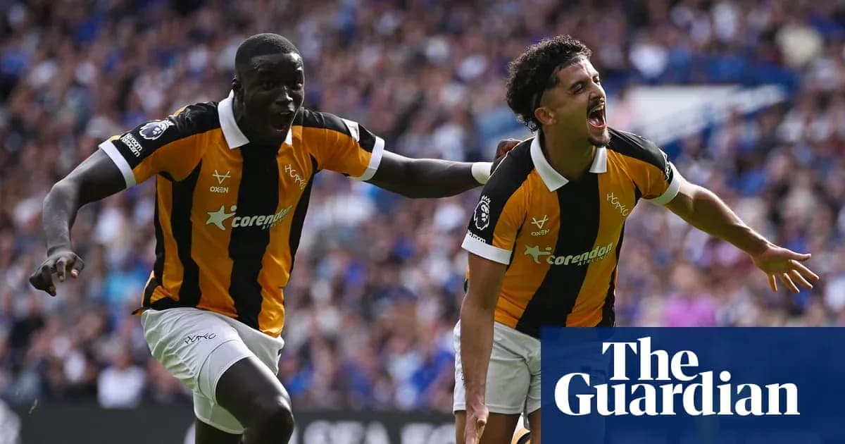 Two players celebrating a goal during a match