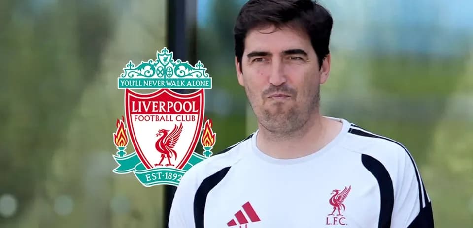 Coach wearing Liverpool FC training gear outdoors