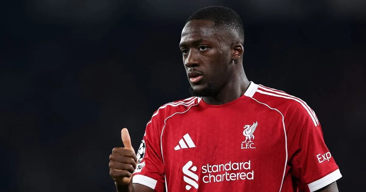 Player in Liverpool kit giving thumbs up gesture