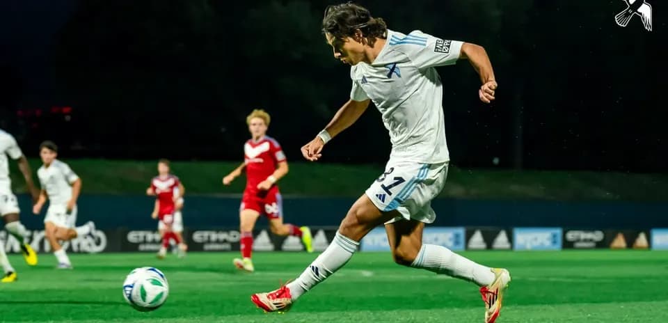 Player taking a shot during MLS Next Pro match