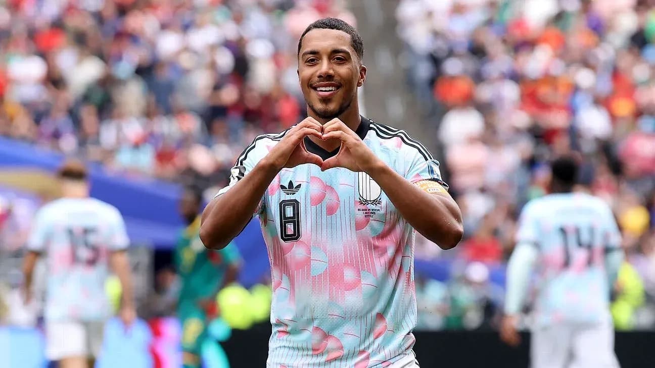Player celebrating by making heart shape gesture