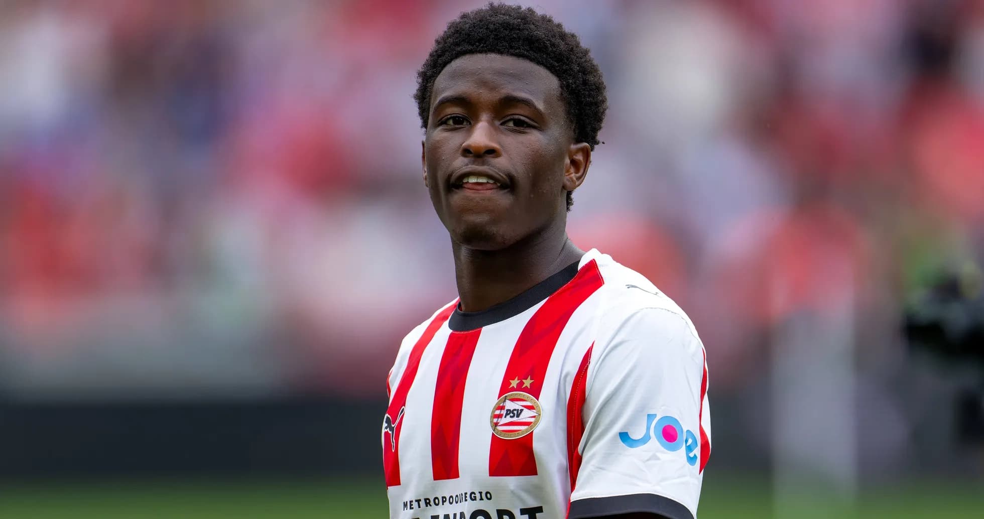 Player in PSV Eindhoven kit during match warm-up