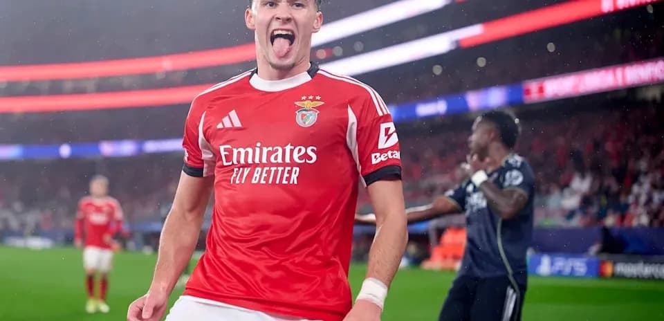Benfica player celebrating a goal in match