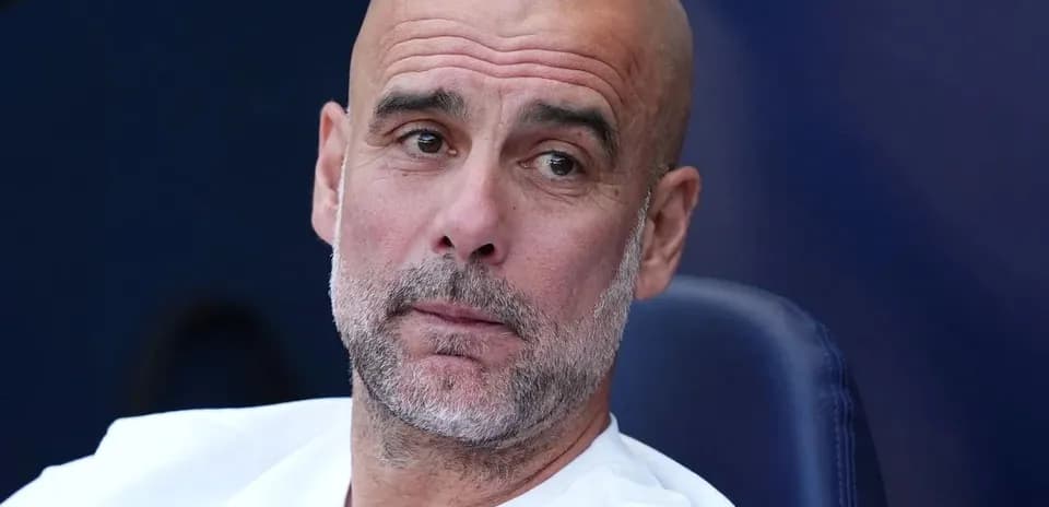 Coach sitting on the bench during a match