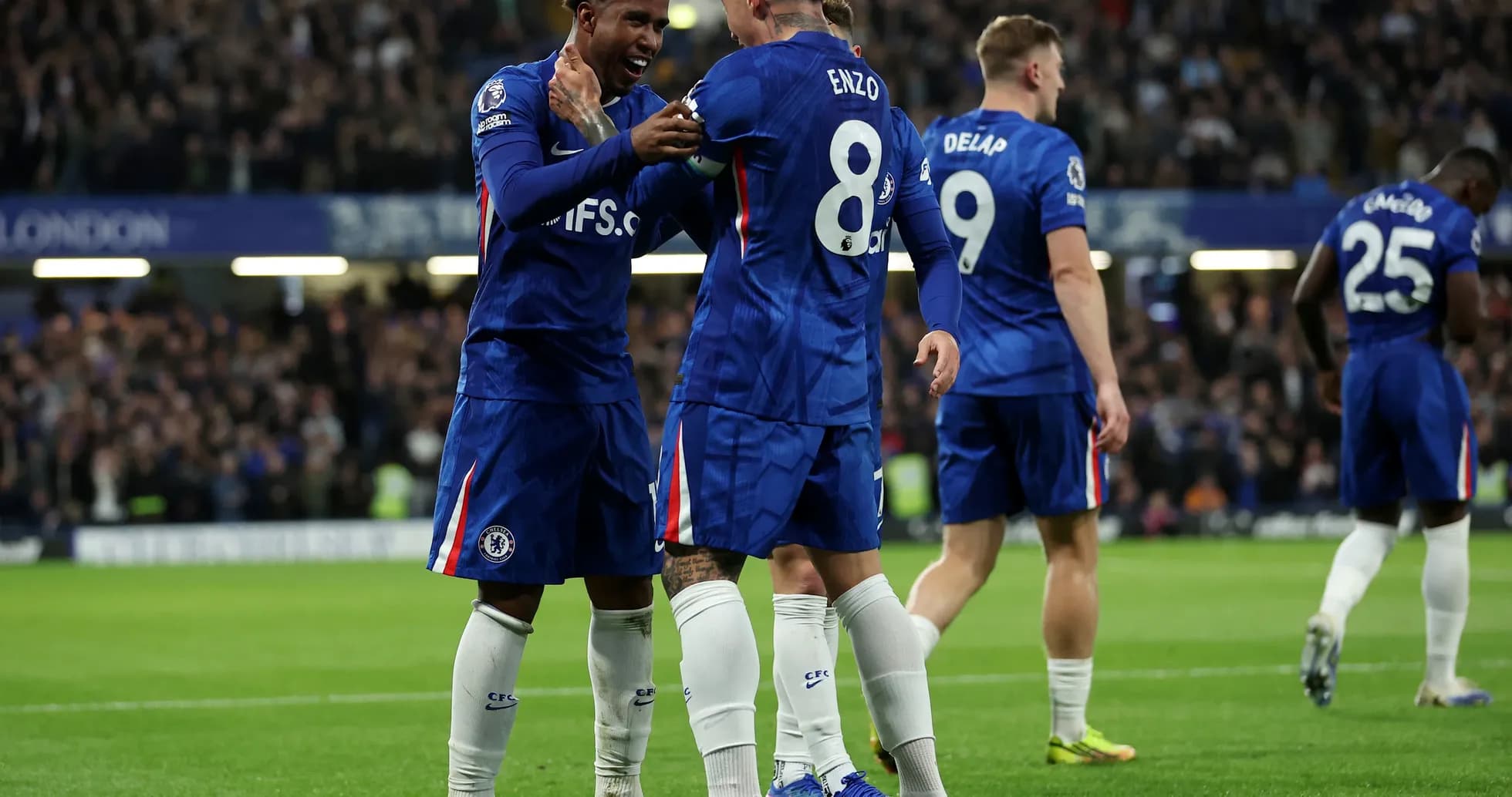 Chelsea players celebrating during Premier League match