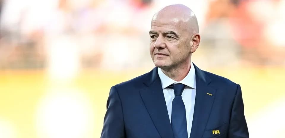 FIFA official walking on the field before match
