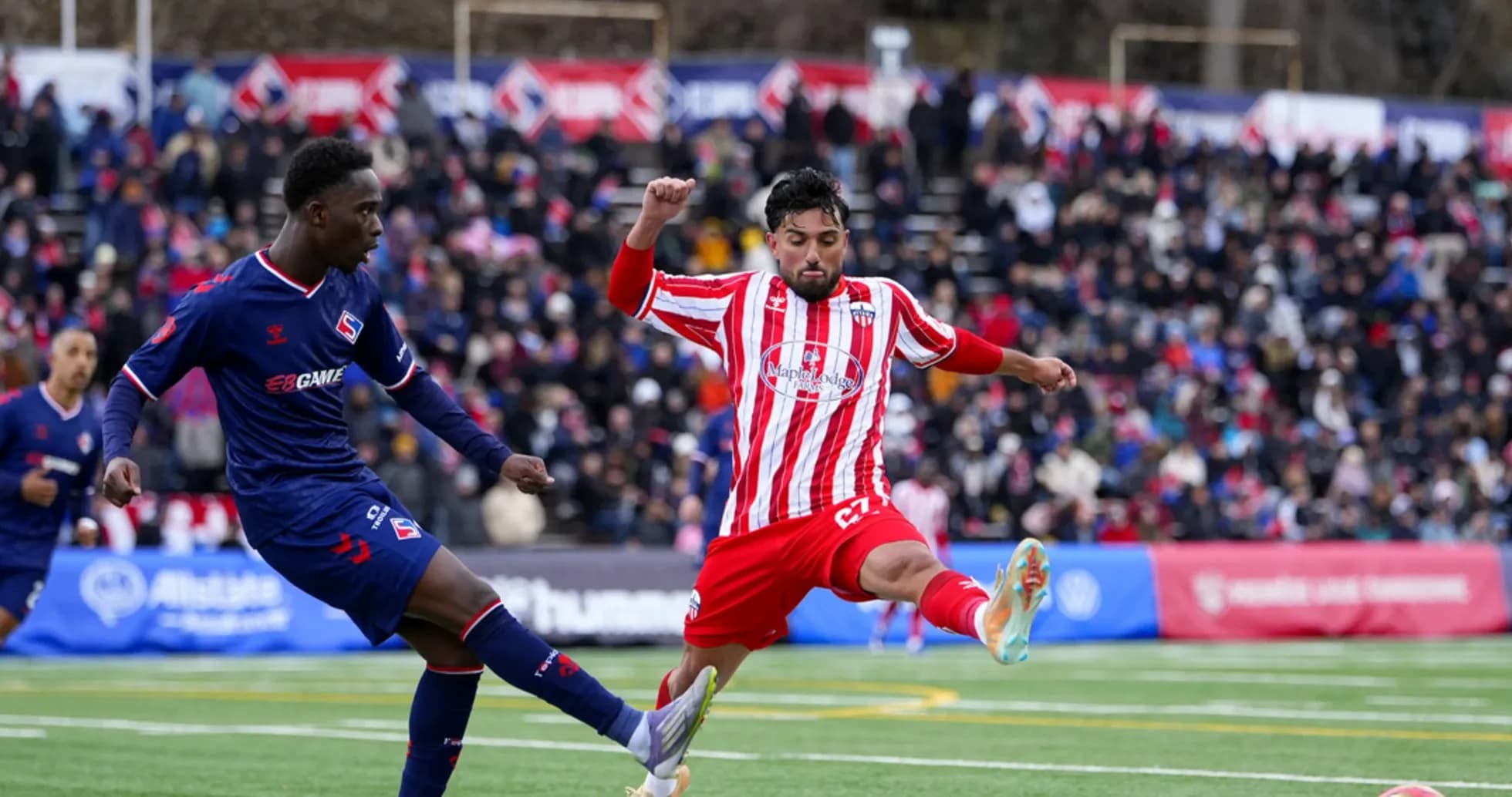 Players competing in Atlético Ottawa match