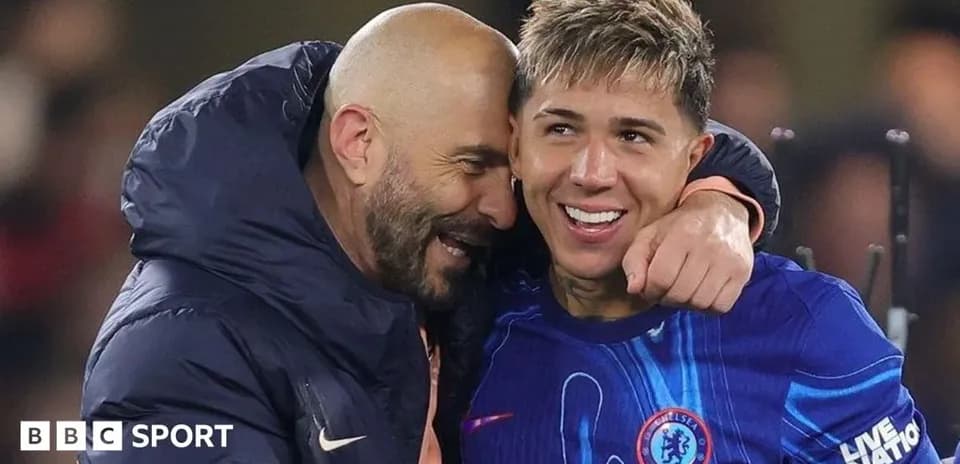 Coach embracing player after match celebration