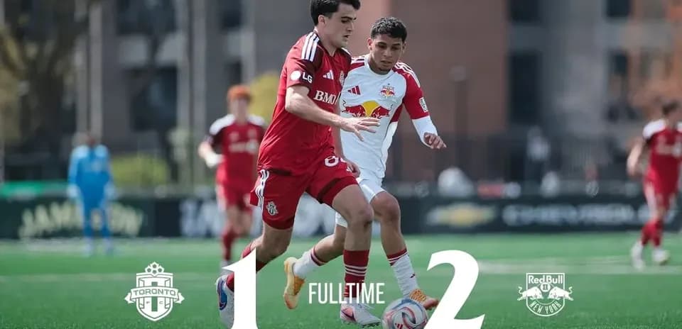 Toronto II player dribbling against New York RB II