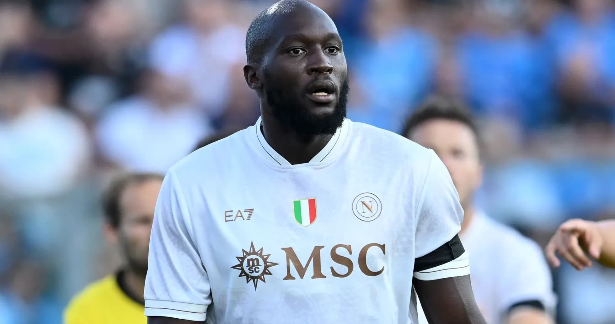 Player in white Napoli kit on the field