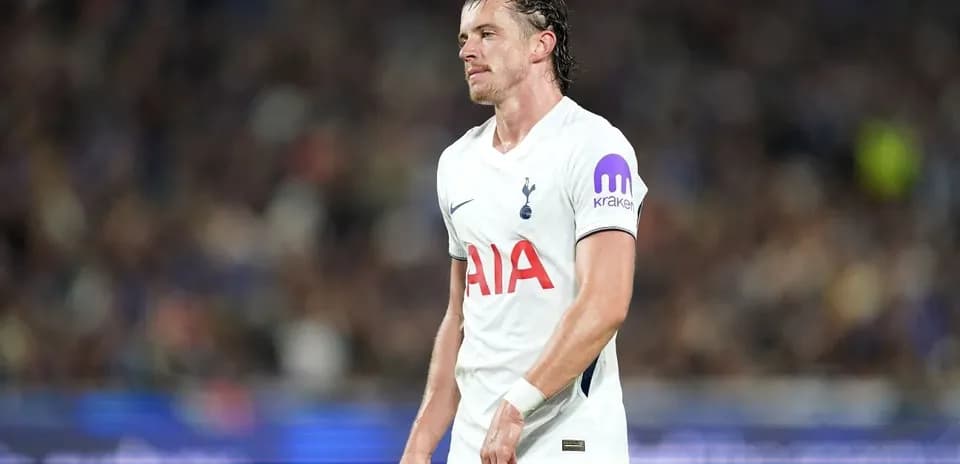 Tottenham player walking off the pitch during match