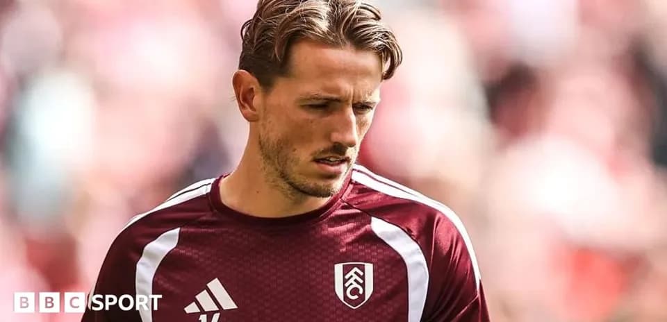 Player wearing Fulham training kit before match