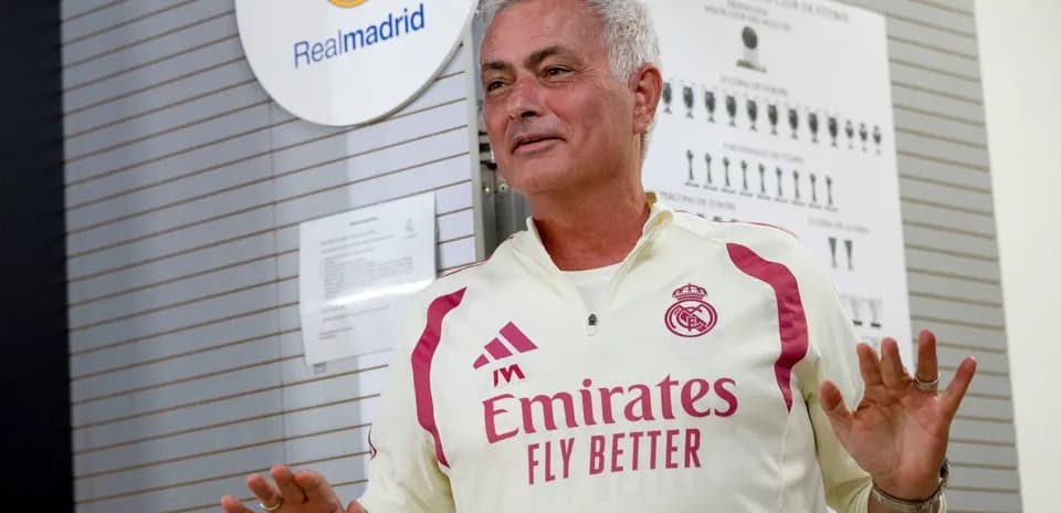 Manager speaking at Real Madrid training facility