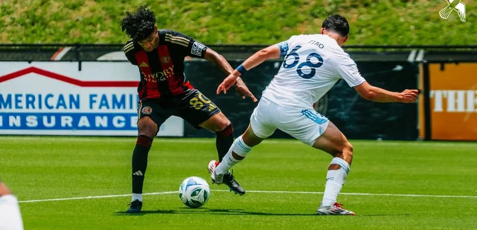 Atlanta United II player dribbling against New York City II