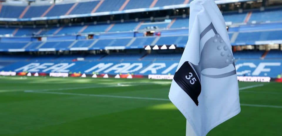 Corner flag with Real Madrid branding in stadium