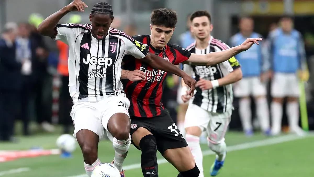 Juventus and AC Milan players battling for the ball